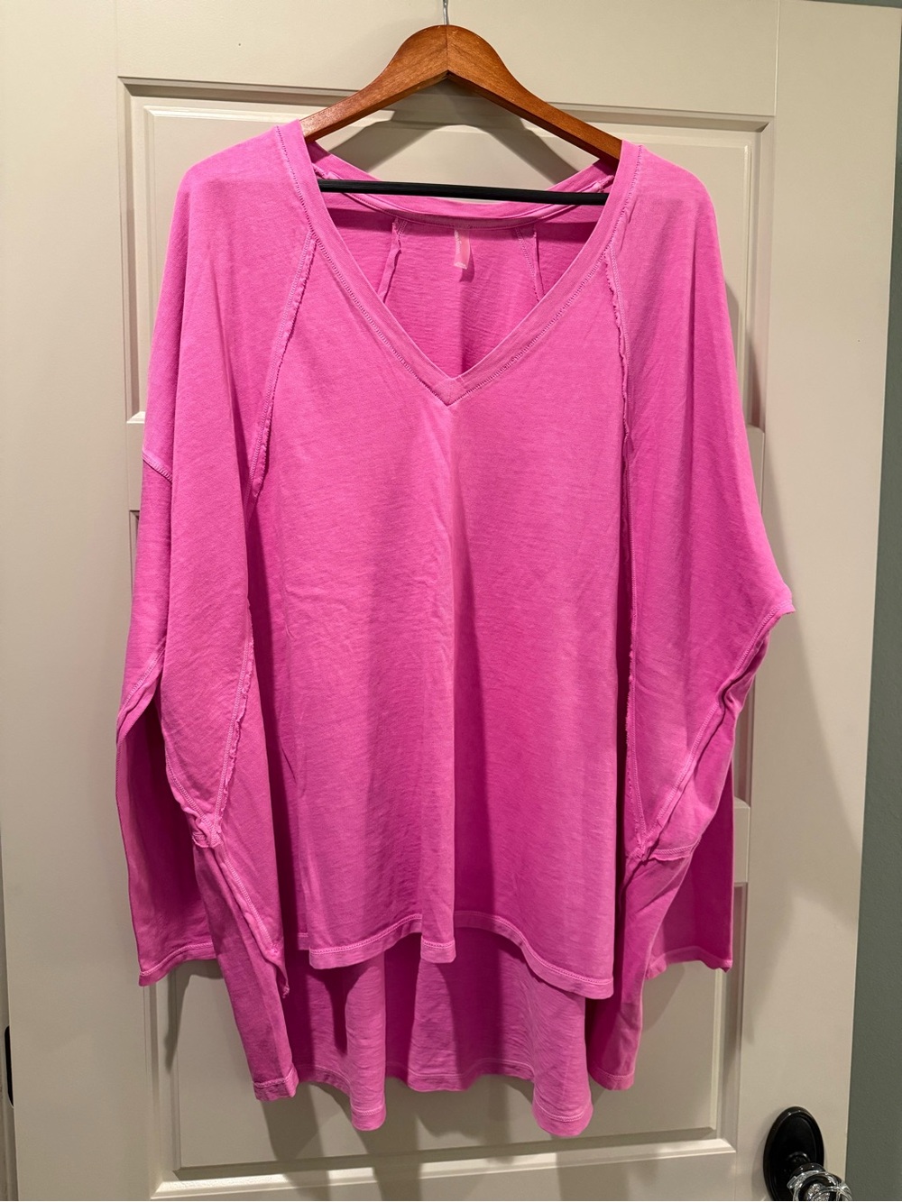 Free People “Throw on Layer” in Bright Pink